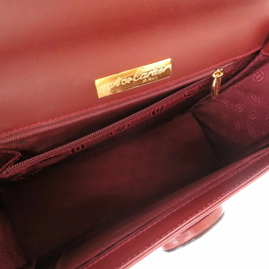Pre-Owned must red bordeaux (Good) line Cartier leather handbag